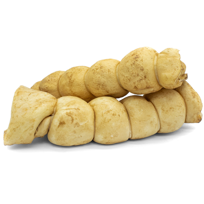 Two cow beef cheek roll dog treats with peanut butter.