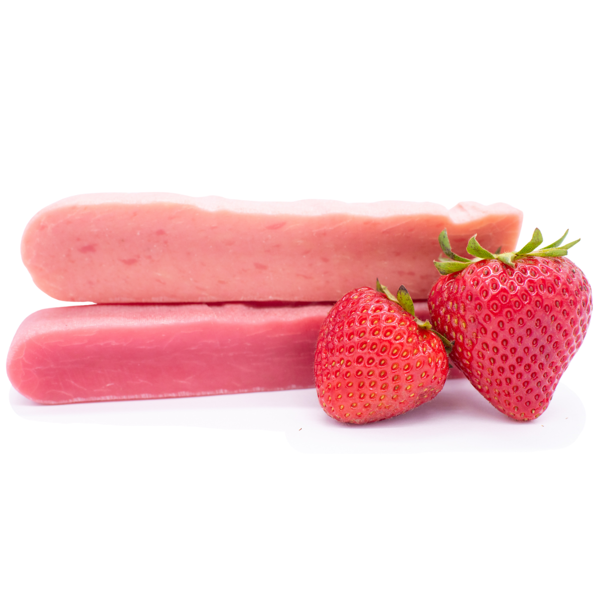 Two medium-sized, pink strawberry-flavoured Himalayan Yak Chews from Bully Bunches displayed alongside a fresh strawberry.